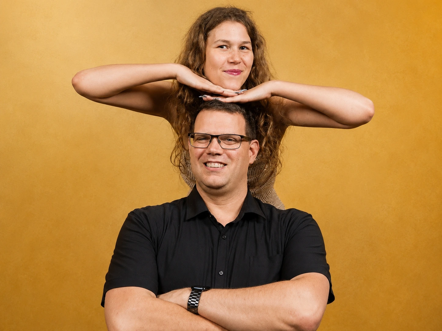Beau Whately and a young filmmaker posing together against a warm festival backdrop